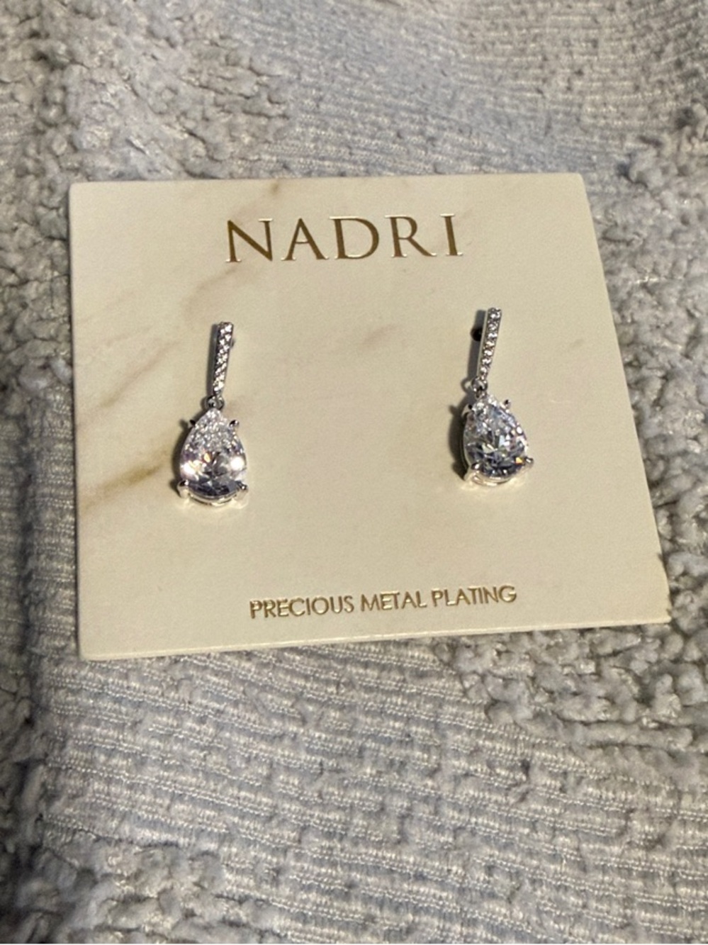 NADRI Silver Teardrop Dangle Earrings with Clear Stones